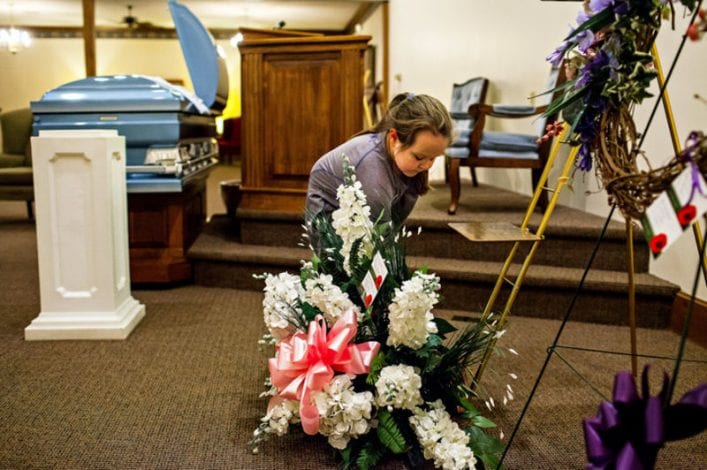 Whitney Davis helping at her grandmother's funeral home.